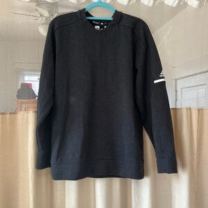 Adidas pull over sweater, size medium, and excellent condition unisex